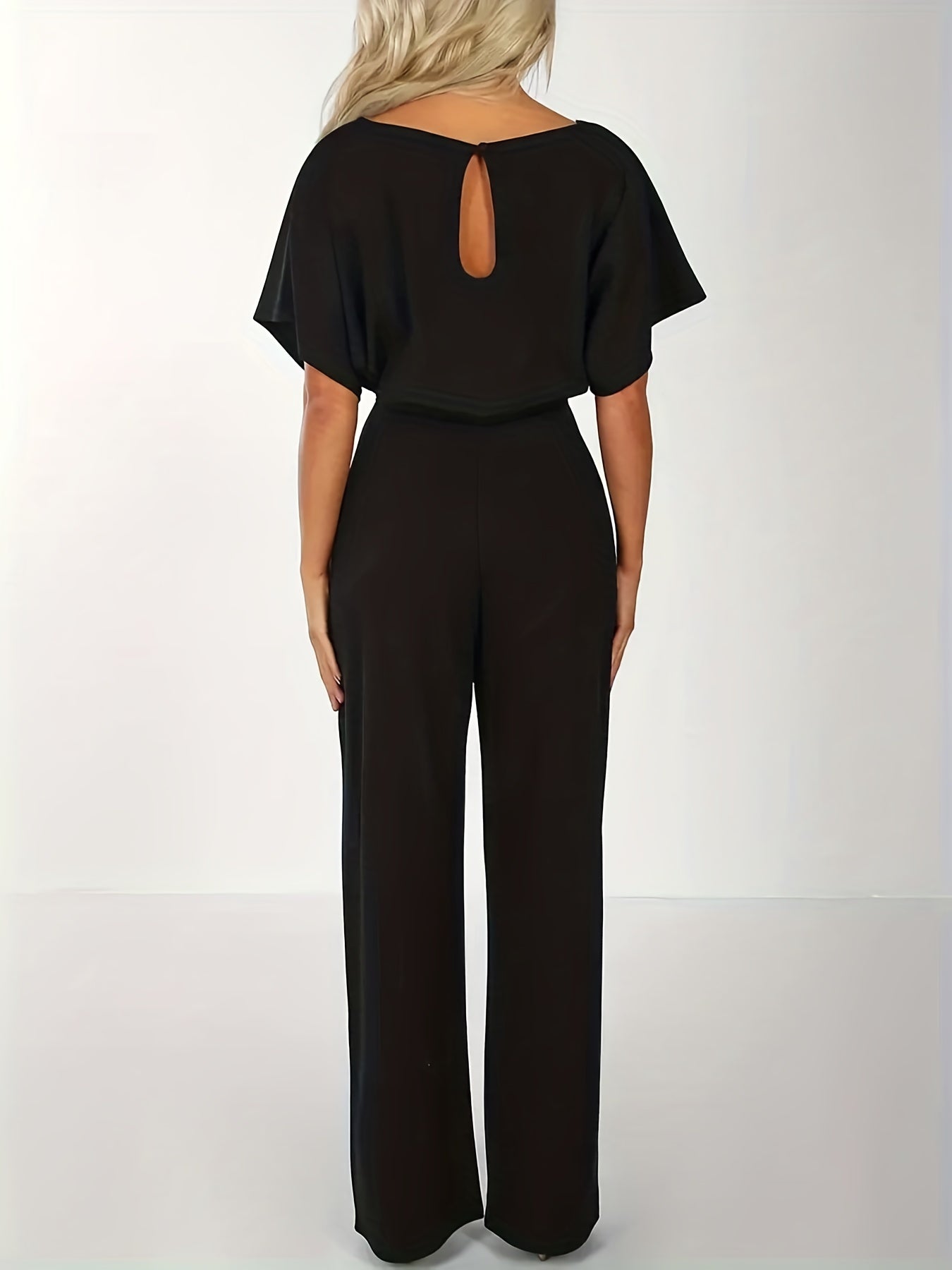 Wide jumpsuit with waistband