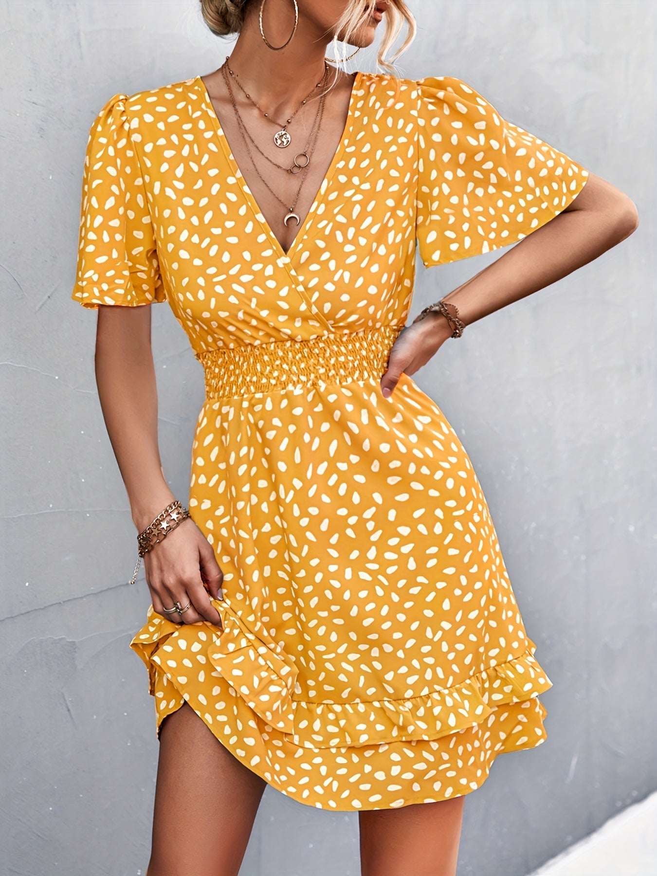 Dress with polka dots and ruffle sleeves