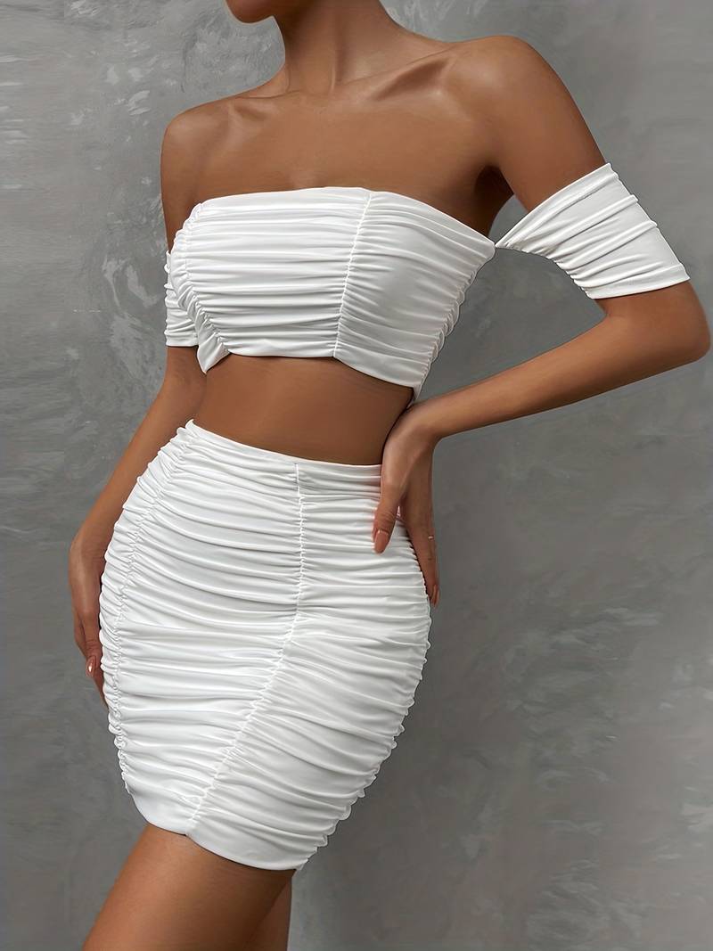 Elegant top and skirt with ruffles on the shoulders