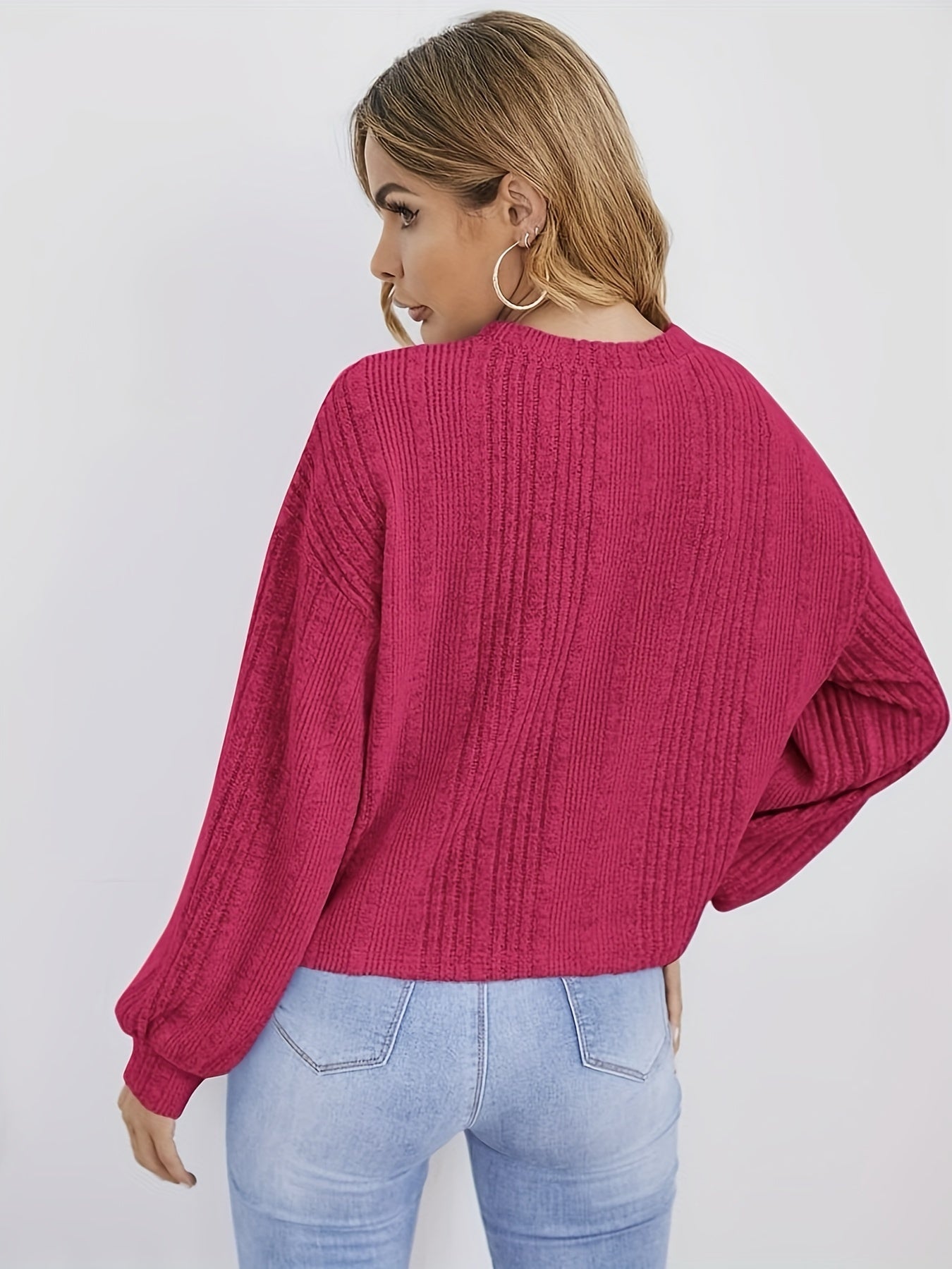 Ribbed sweater with round neck and pearl decoration