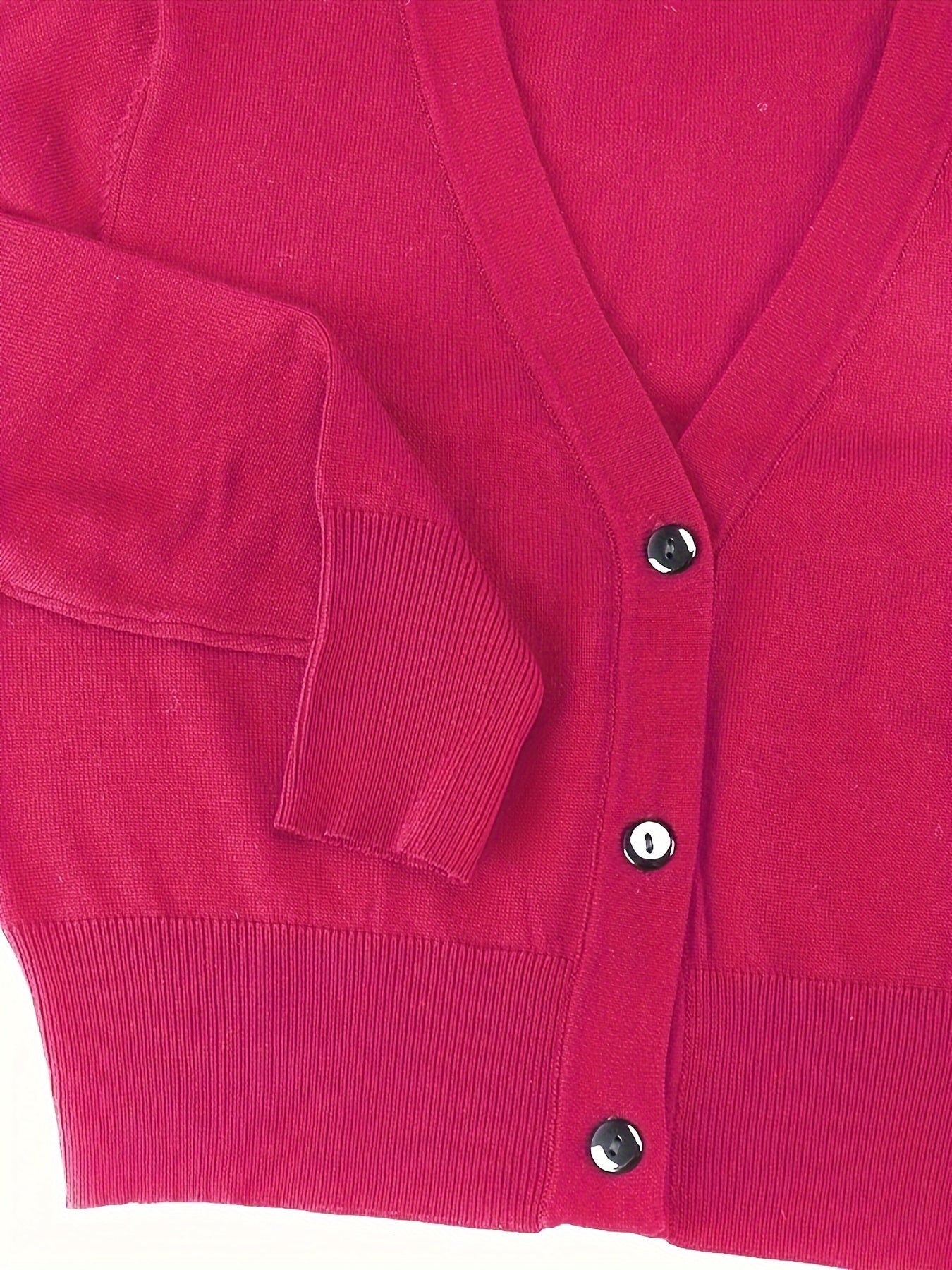 Bolero cardigan with button closure