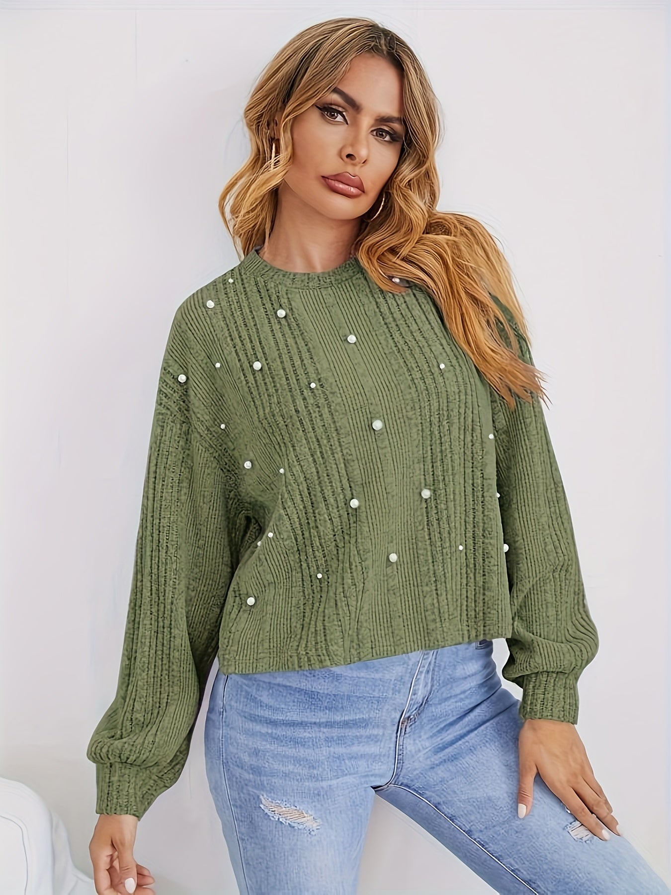 Ribbed sweater with round neck and pearl decoration