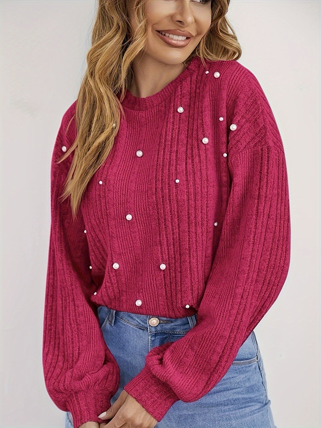 Ribbed sweater with round neck and pearl decoration