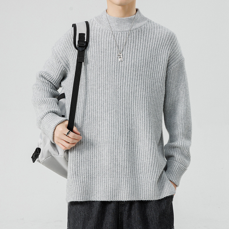 Knitted sweater with high collar