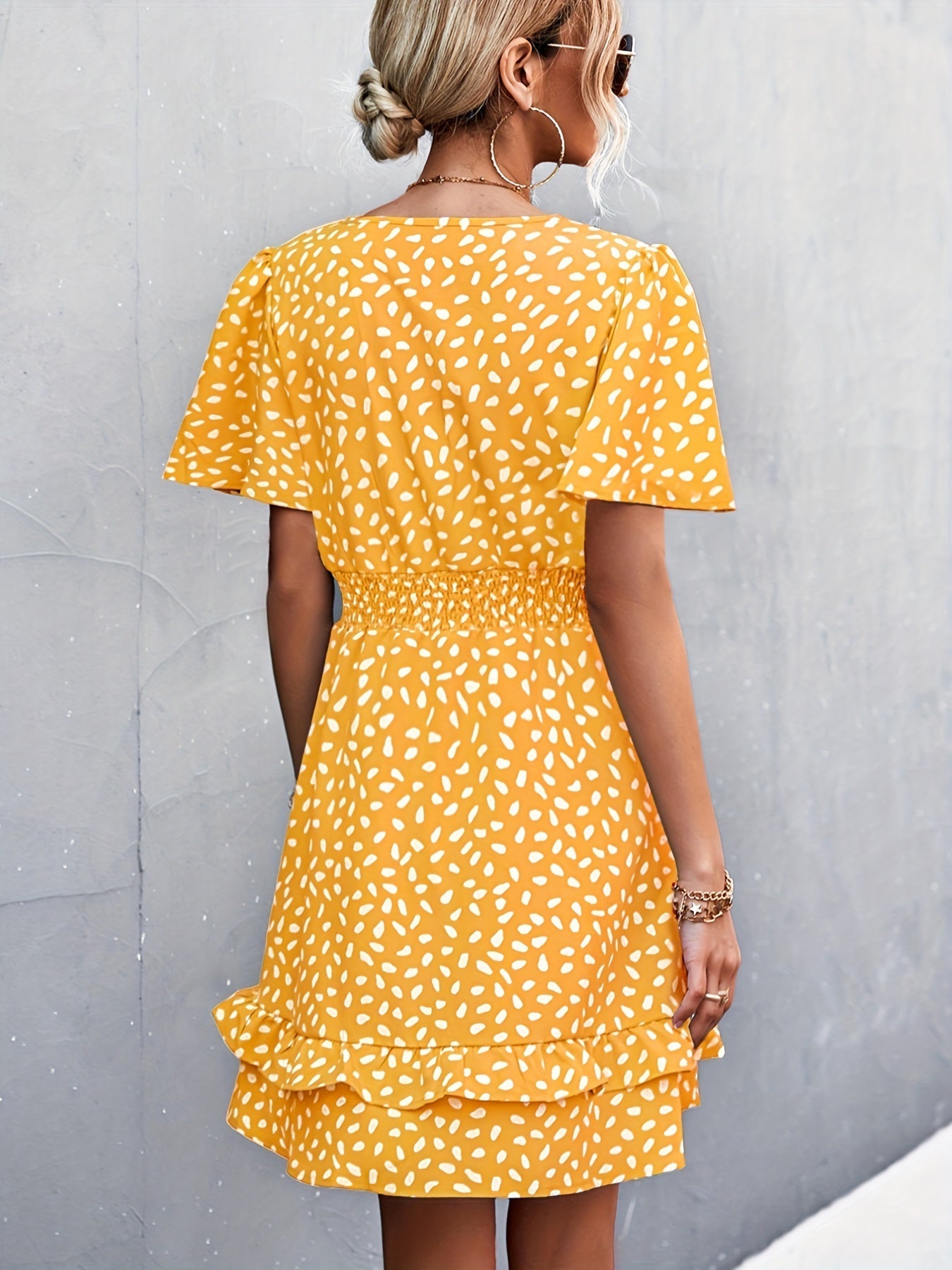 Dress with polka dots and ruffle sleeves