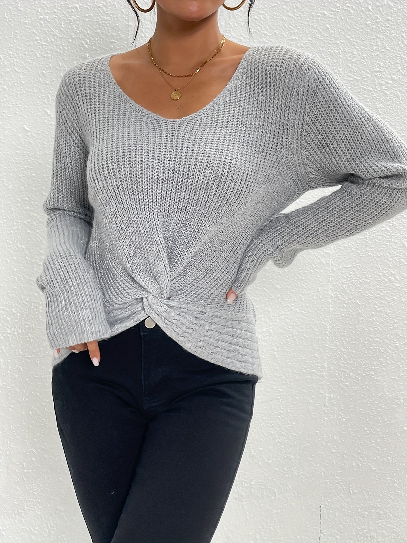 V-neck sweater with twisted front for women