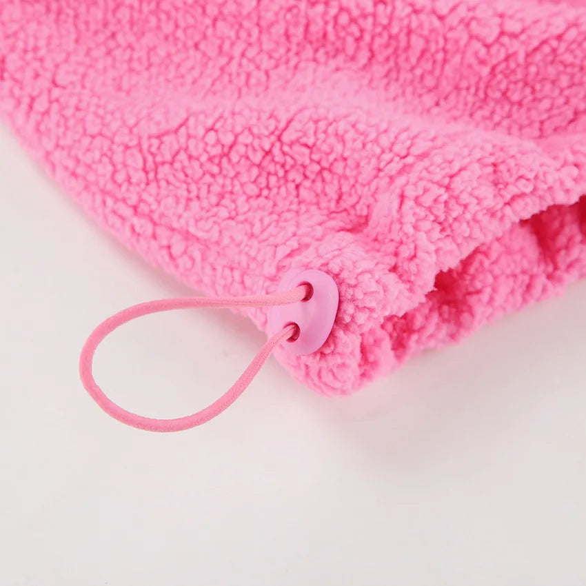 Pink sweater made of knitted lamb fleece