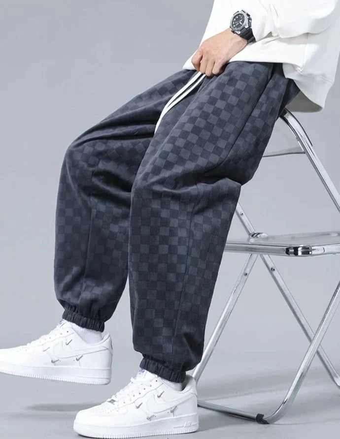 Wide sports pants with checkerboard pattern