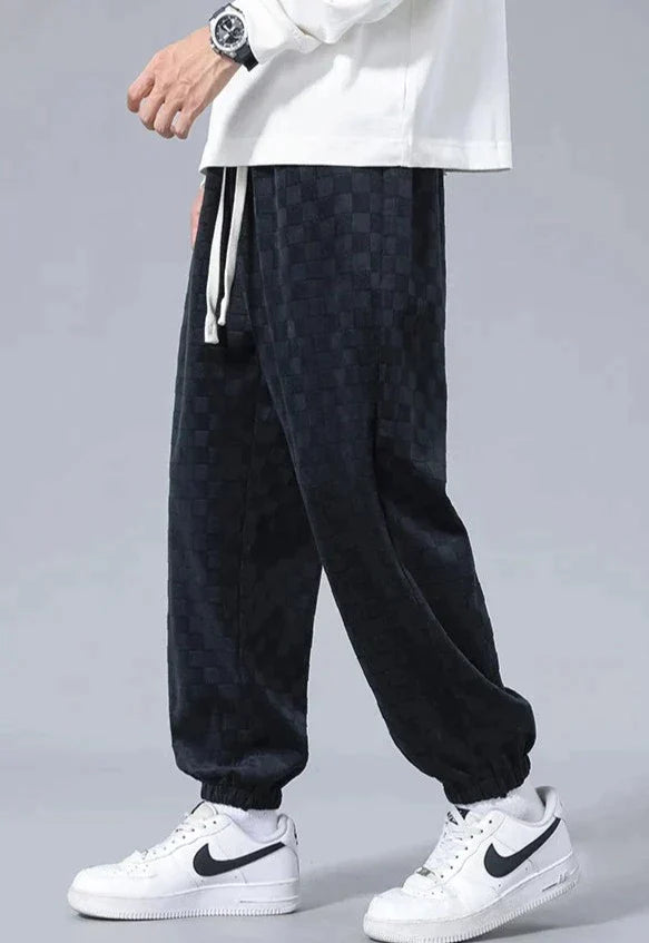 Wide sports pants with checkerboard pattern