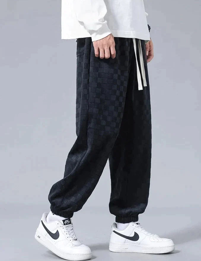 Wide sports pants with checkerboard pattern