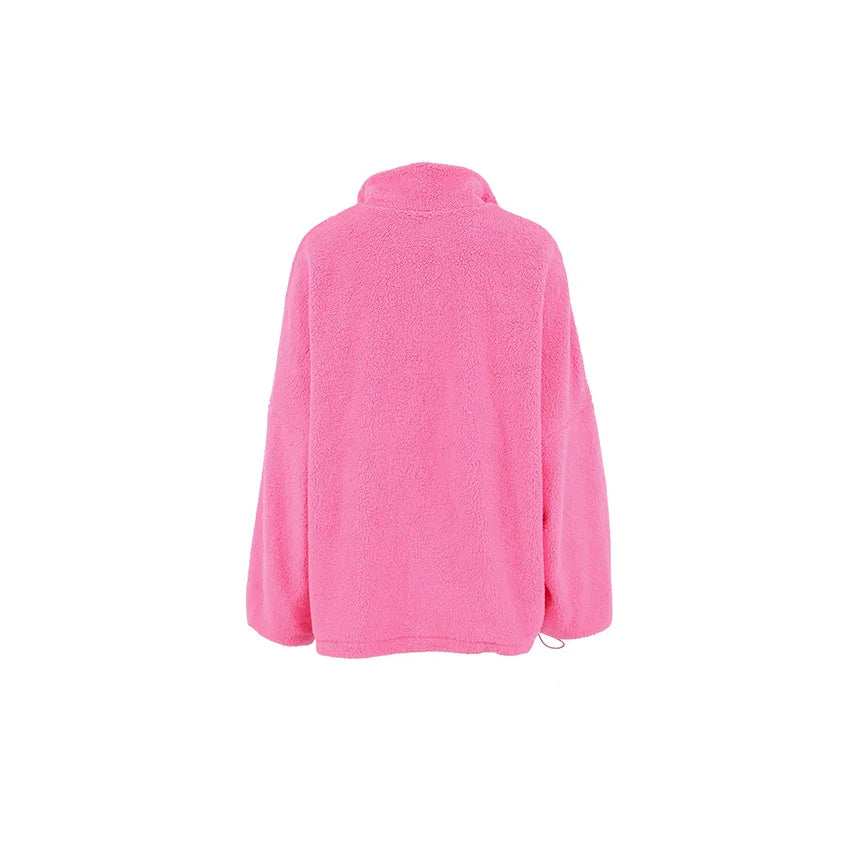 Pink sweater made of knitted lamb fleece