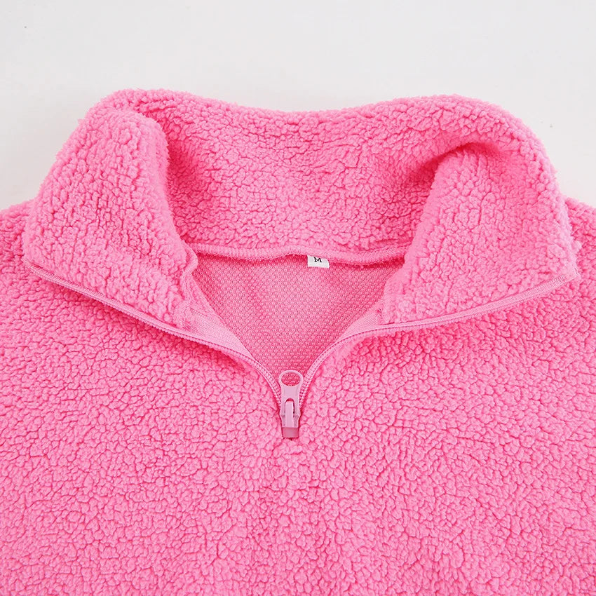 Pink sweater made of knitted lamb fleece