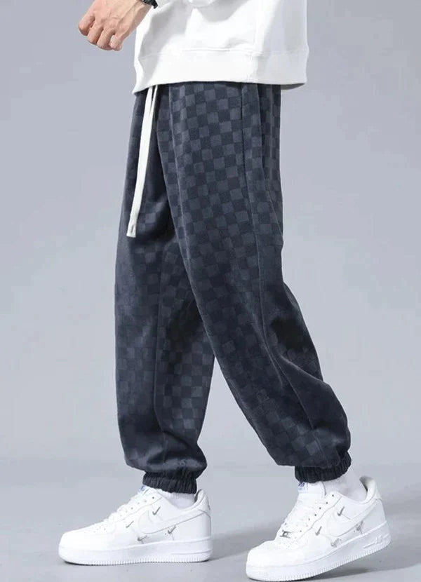 Wide sports pants with checkerboard pattern