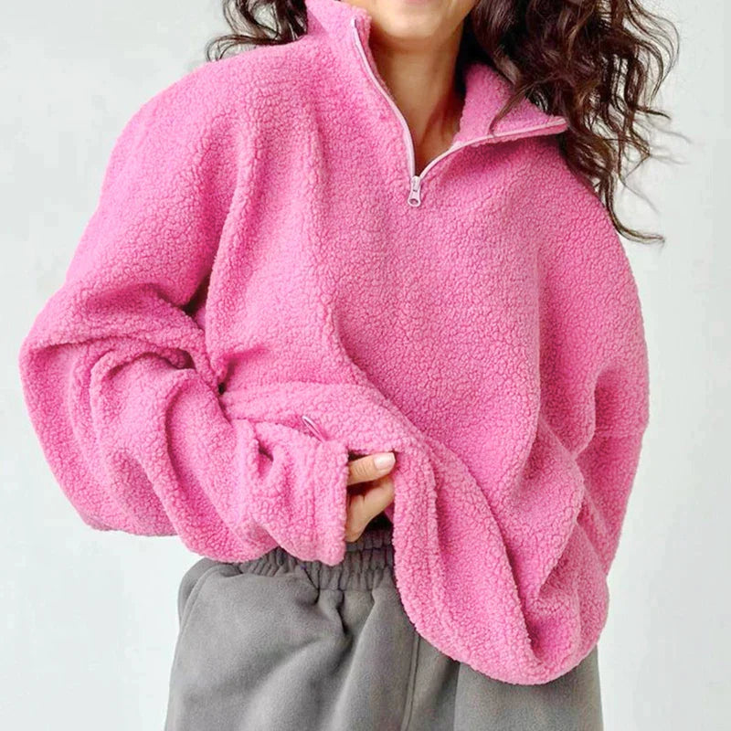 Pink sweater made of knitted lamb fleece