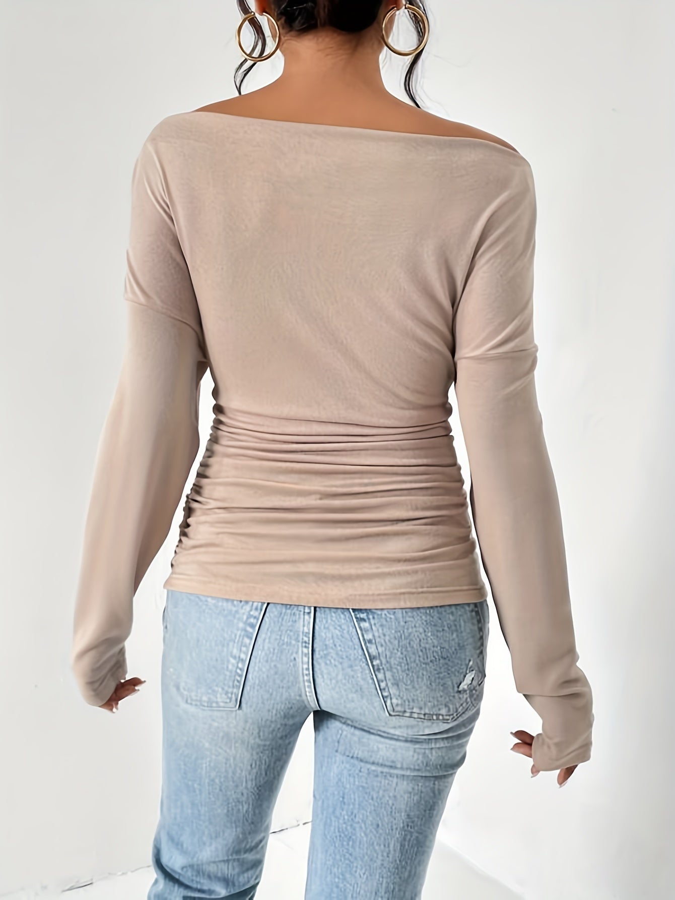 T-shirt with asymmetrical neckline and ruffles