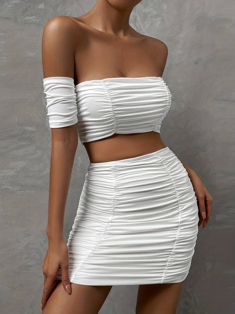 Elegant top and skirt with ruffles on the shoulders