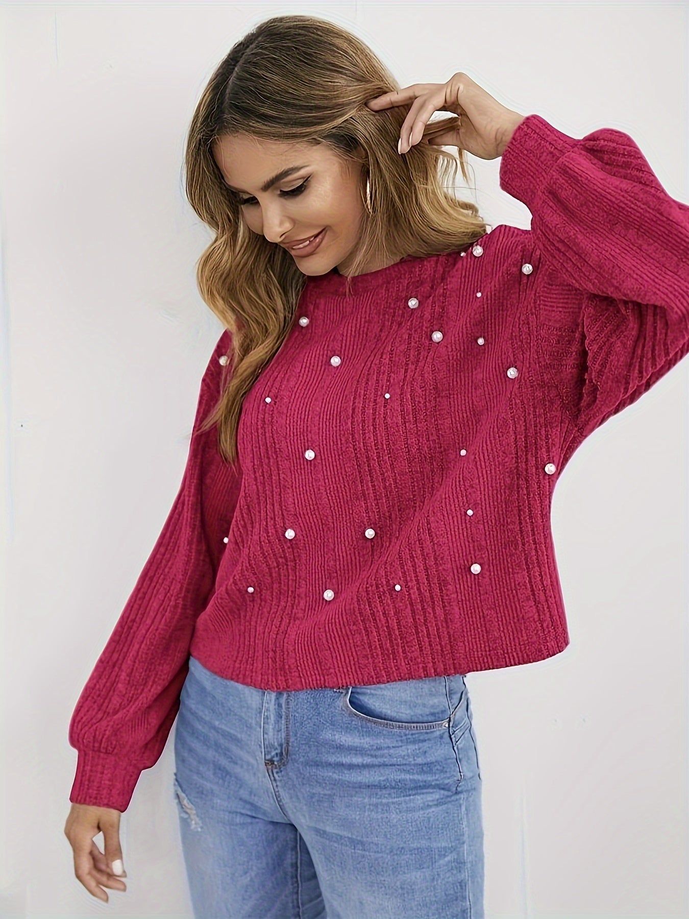 Ribbed sweater with round neck and pearl decoration