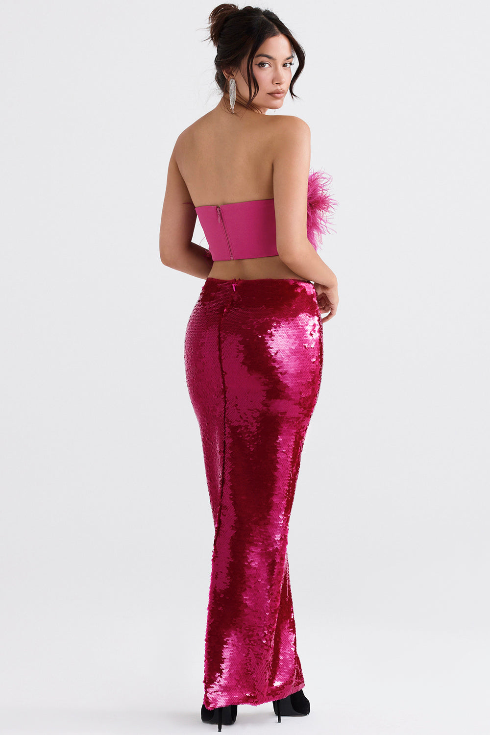 Bright pink bandeau with sequins and maxi skirt