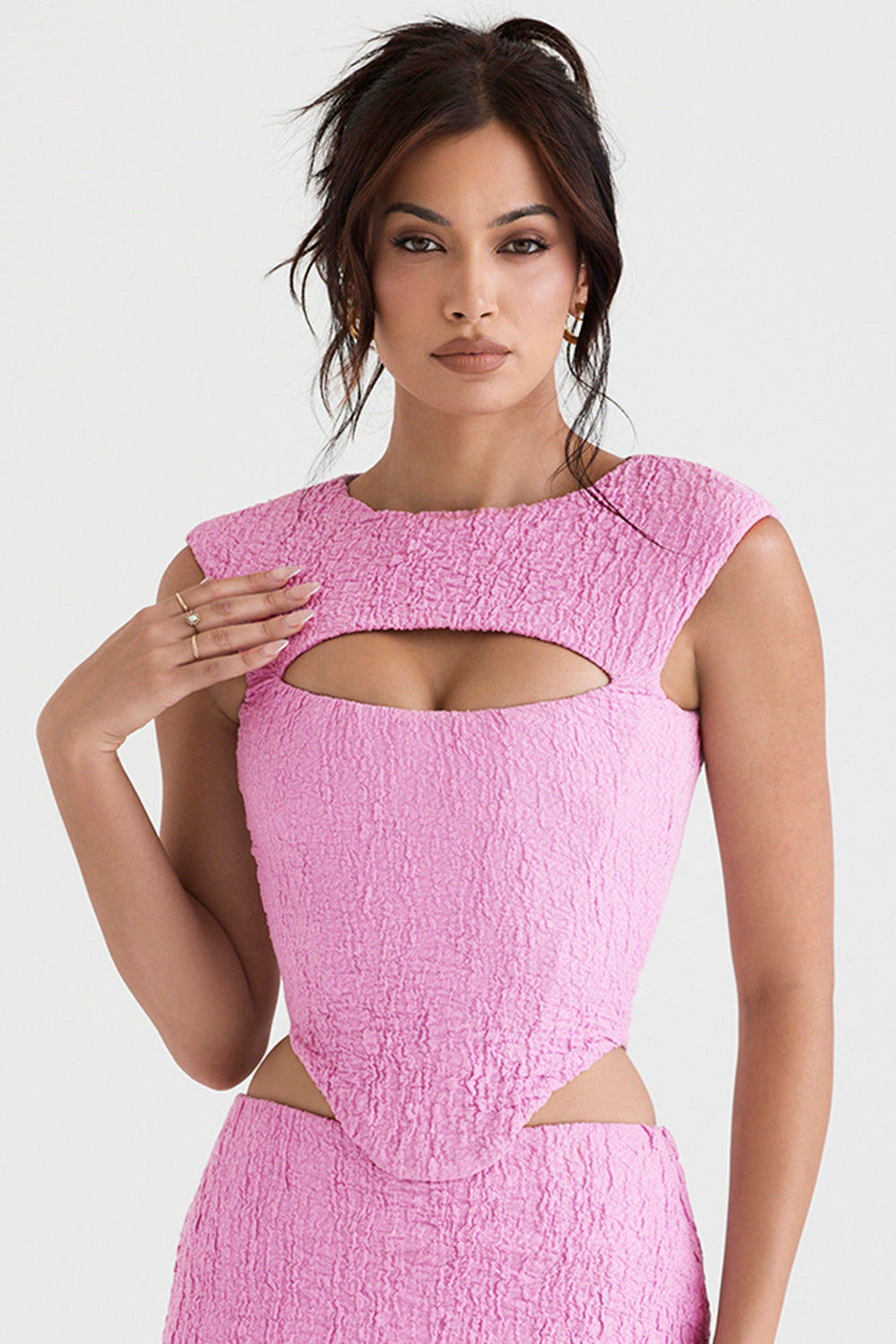 Pink cut out corset with mini skirt