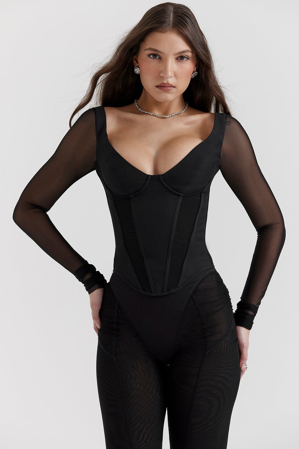 Black long-sleeved corset and high-waisted pants