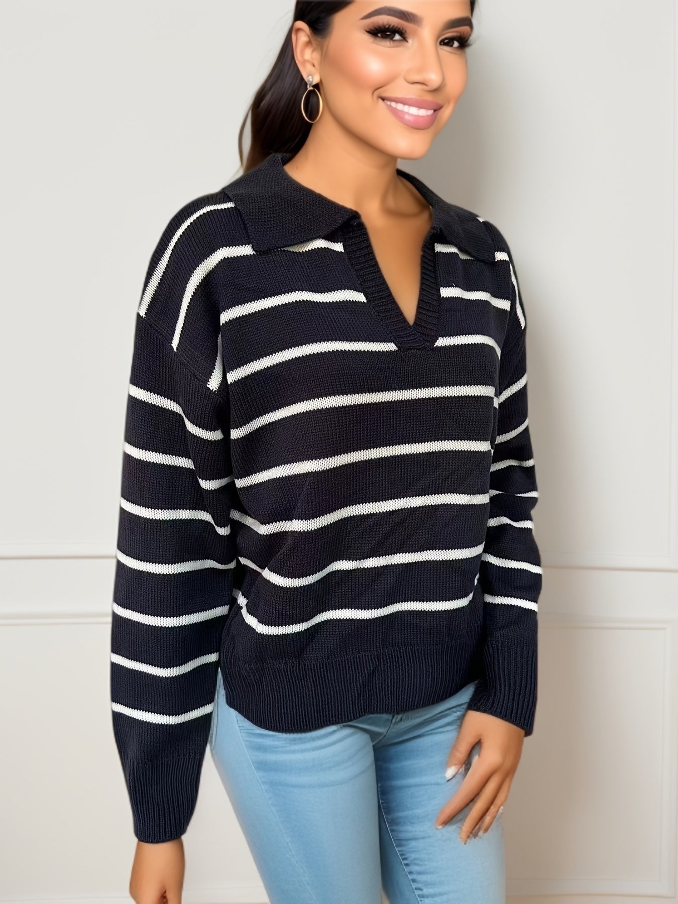 Knitted sweater with dropped shoulders and striped print