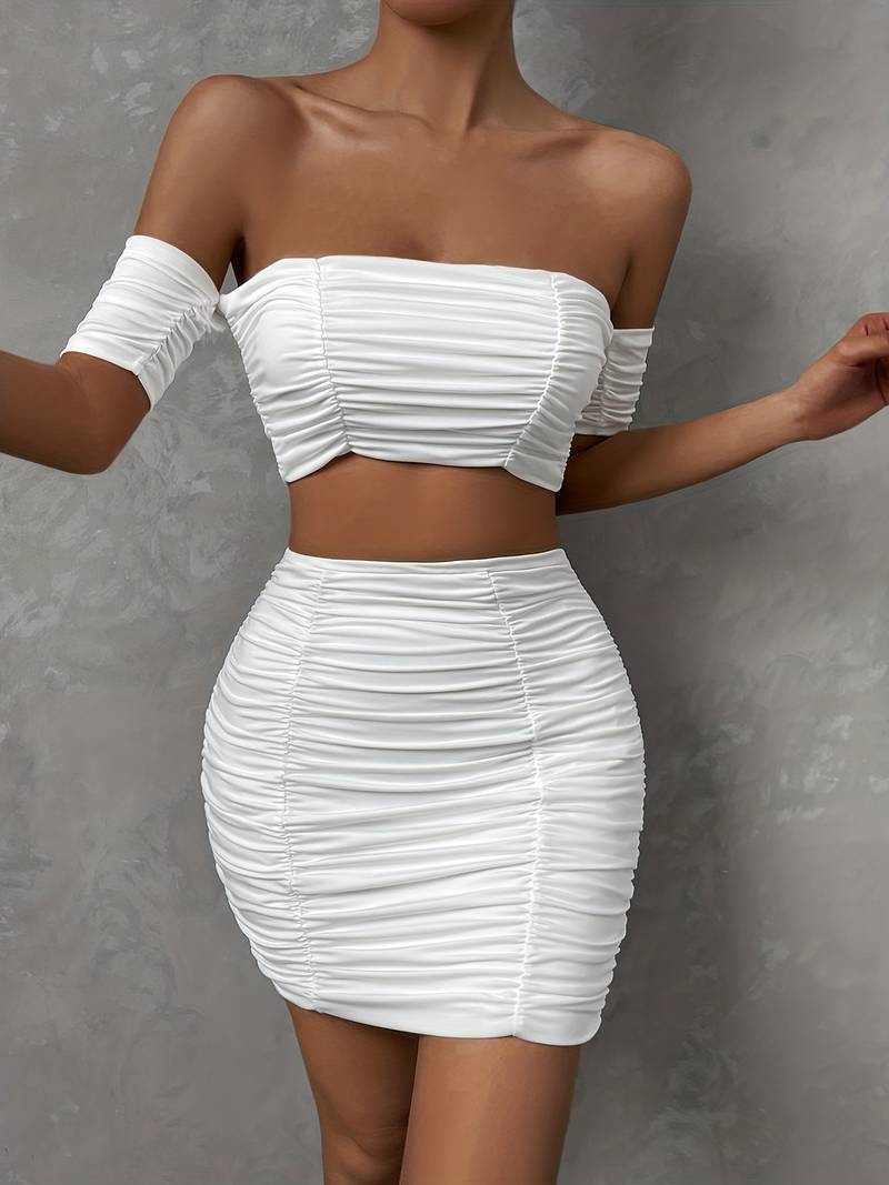 Elegant top and skirt with ruffles on the shoulders