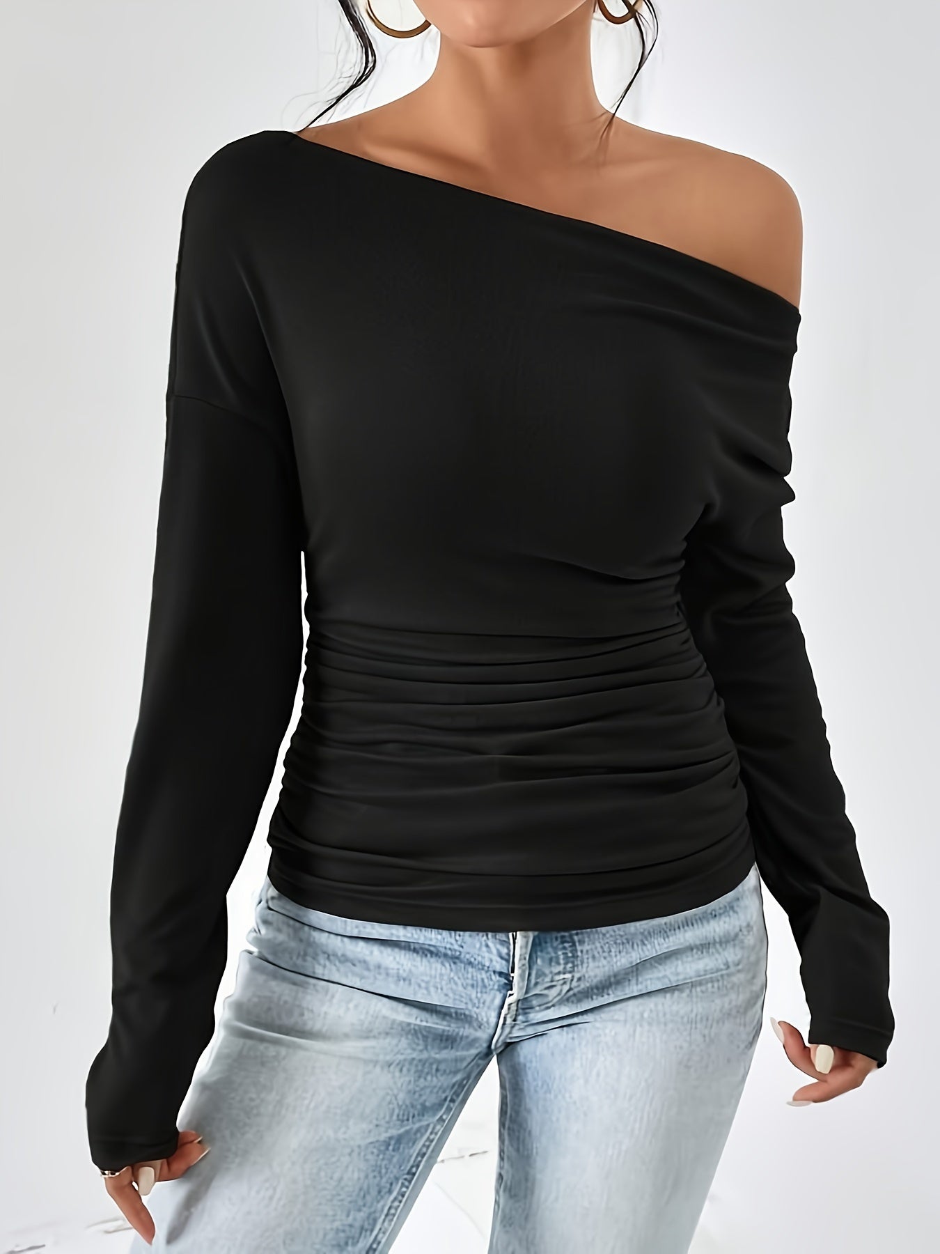 T-shirt with asymmetrical neckline and ruffles