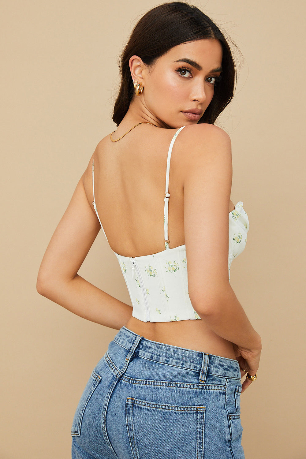 Ivory-colored draped corset with flowers