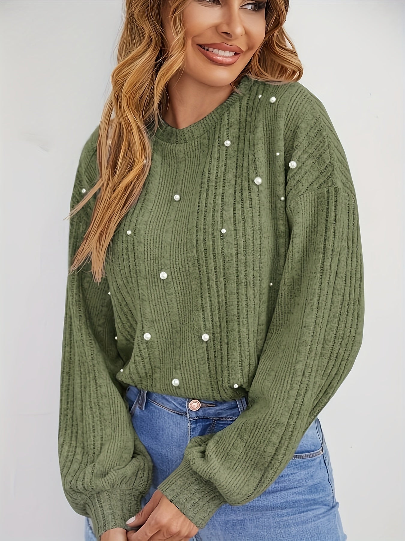 Ribbed sweater with round neck and pearl decoration