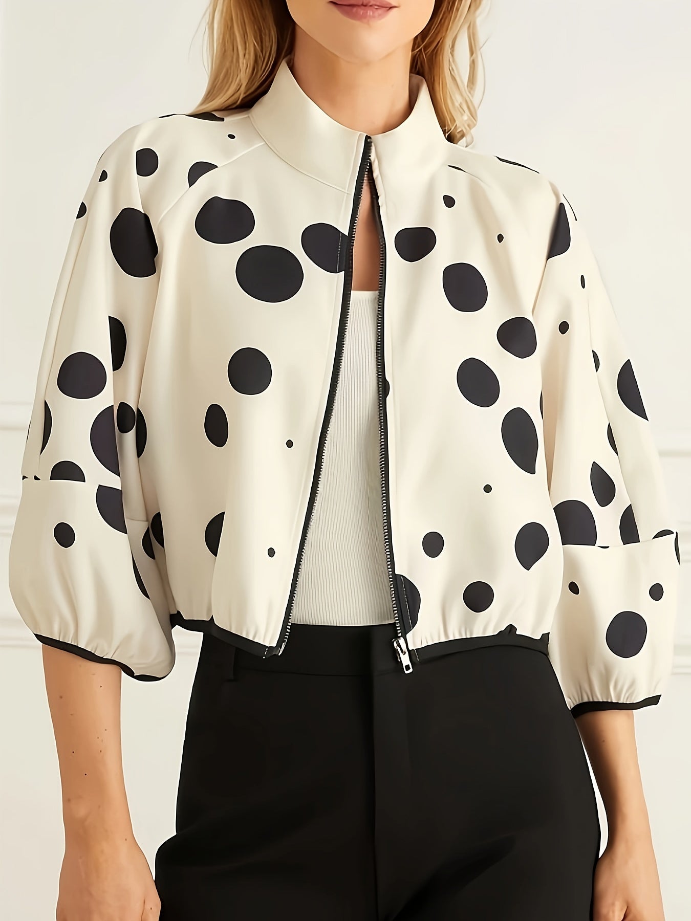 Zippered jacket with polka dot print