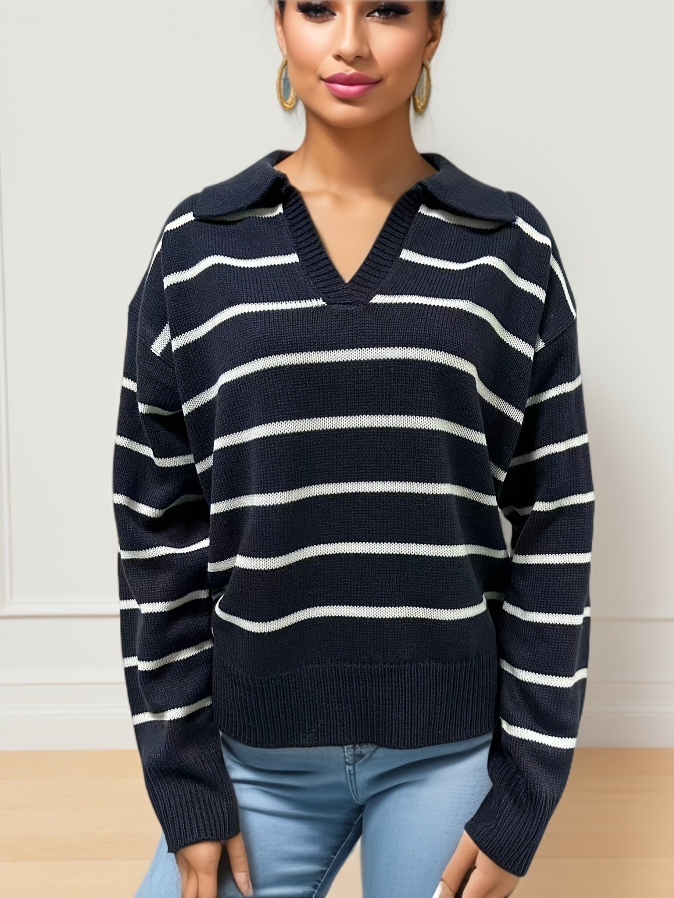 Knitted sweater with dropped shoulders and striped print