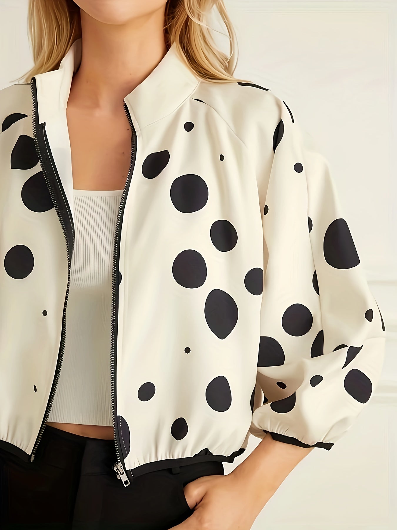 Zippered jacket with polka dot print