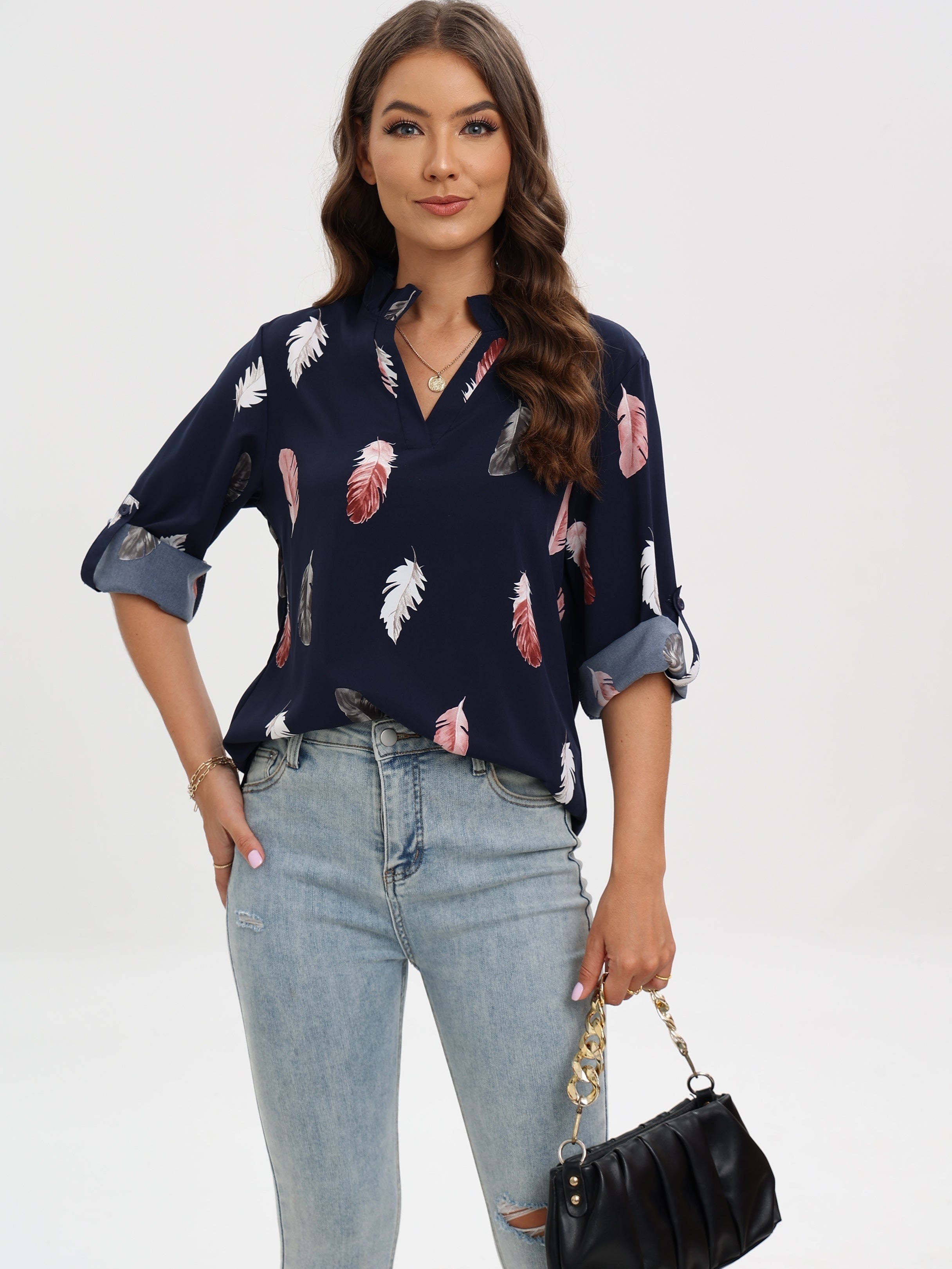 Blouse with notch neck and feather print