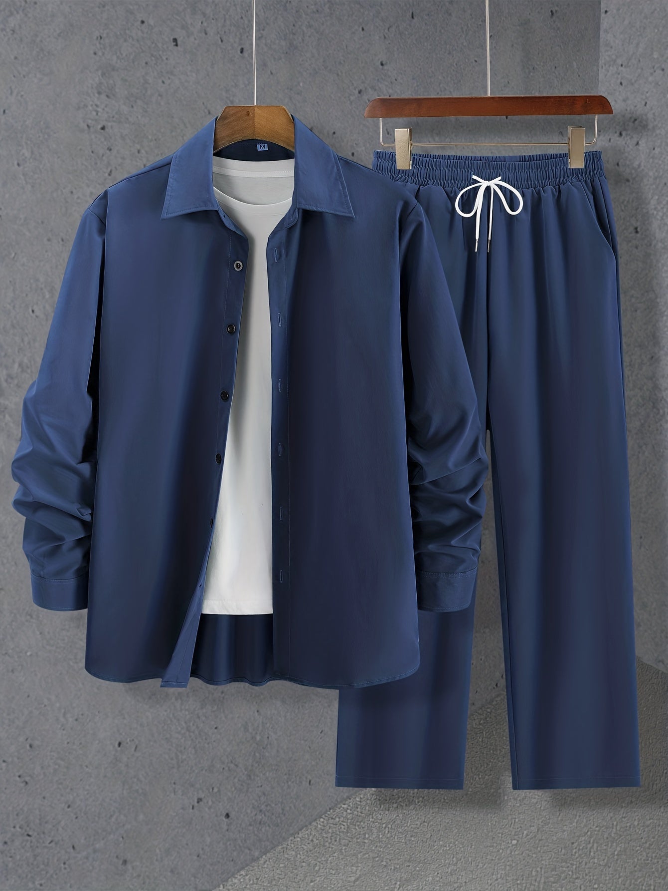 Simple set consisting of a long-sleeved shirt and drawstring trousers for summer