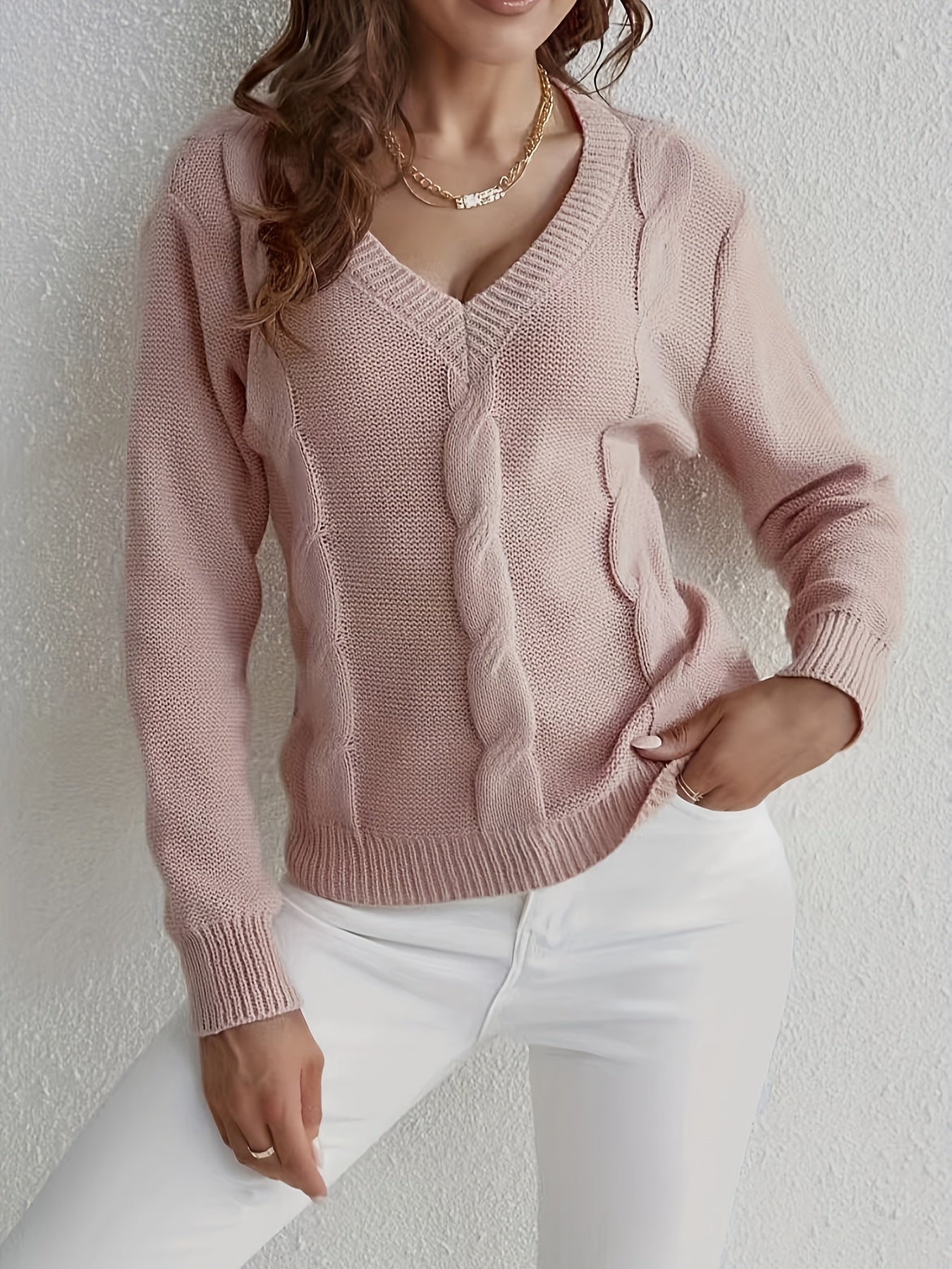 Knitted sweater with V-neck