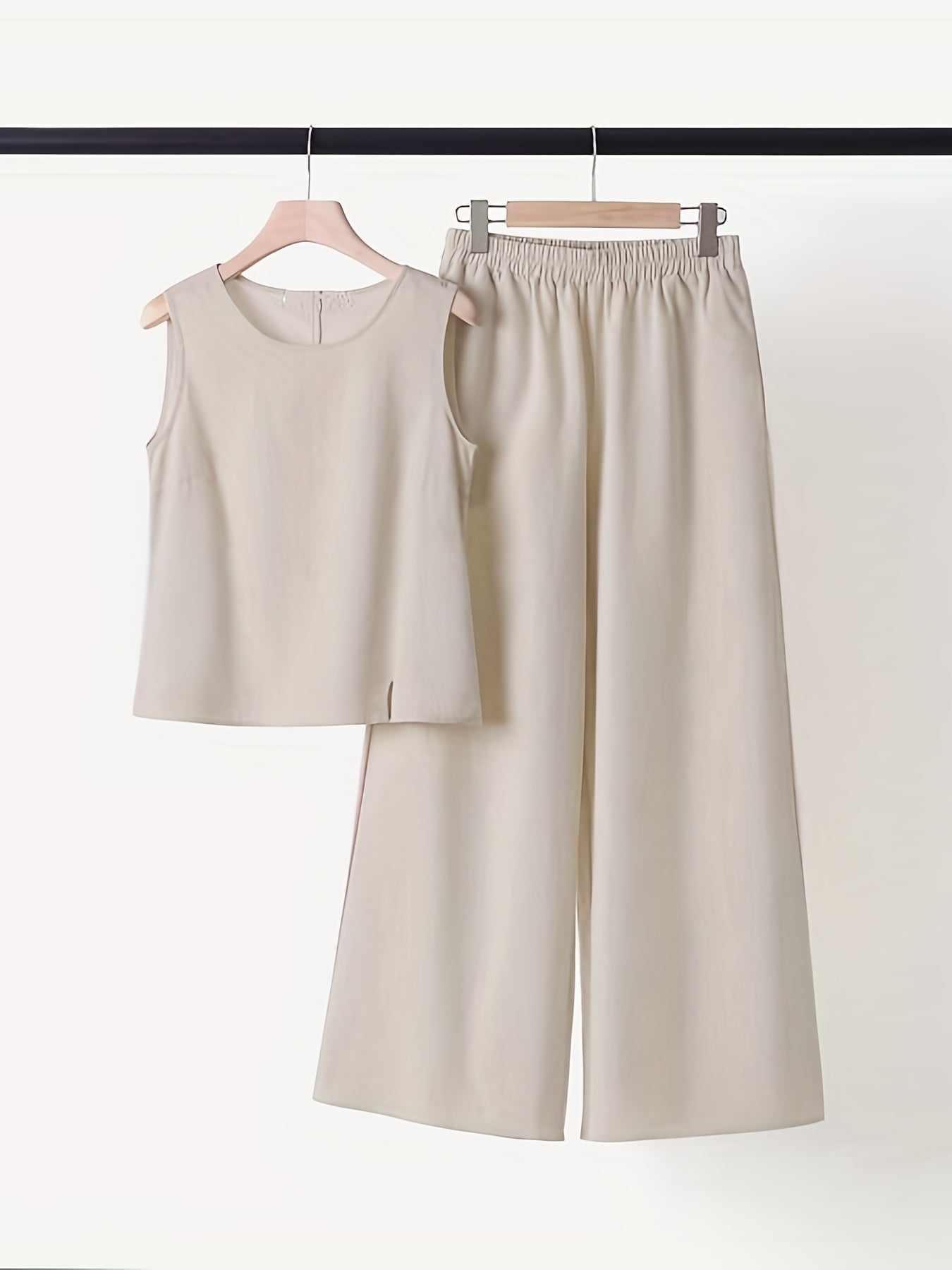 Beige sleeveless tank top and wide leg pants