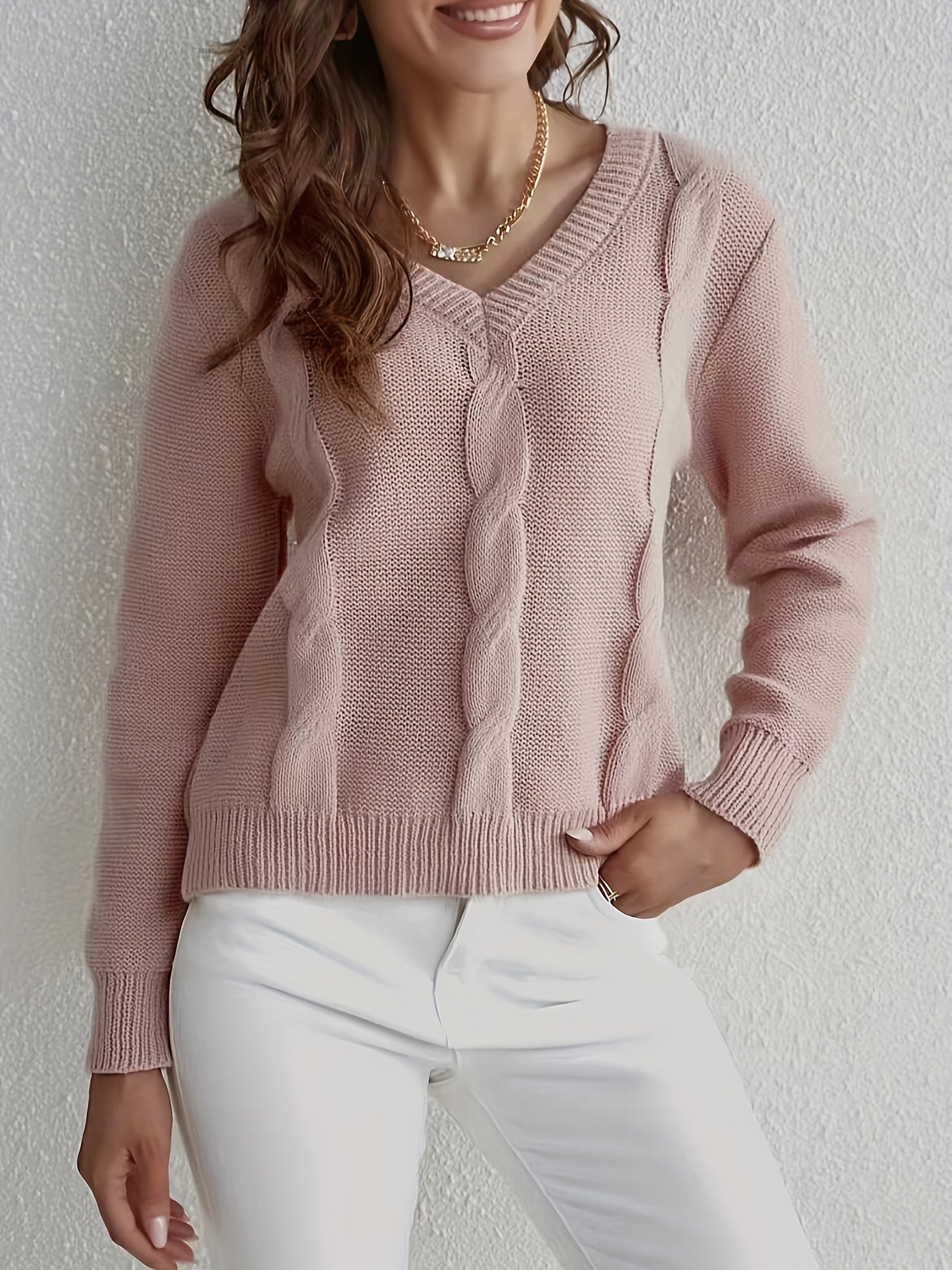 Knitted sweater with V-neck