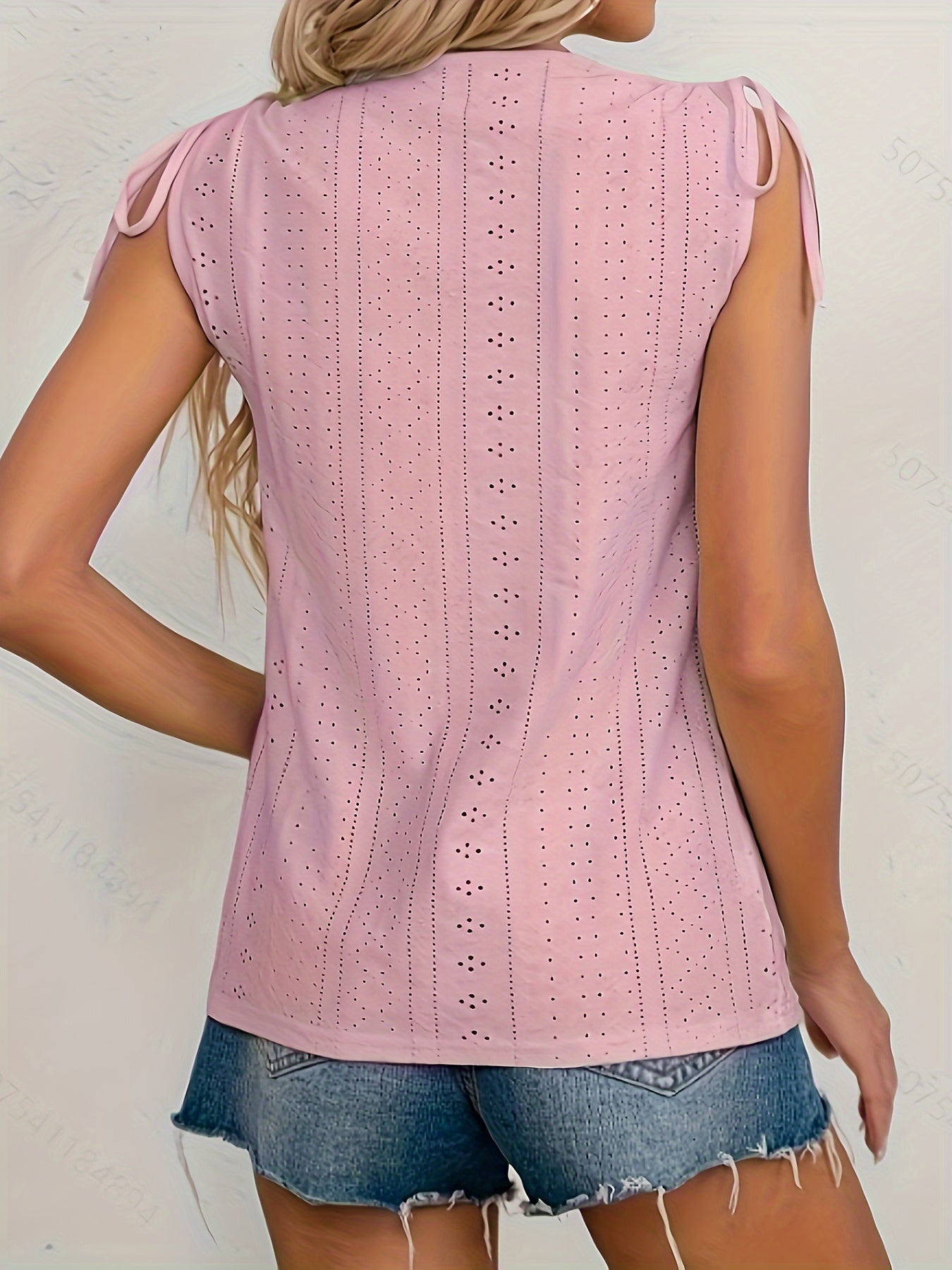 Blouse with short sleeves and eyes