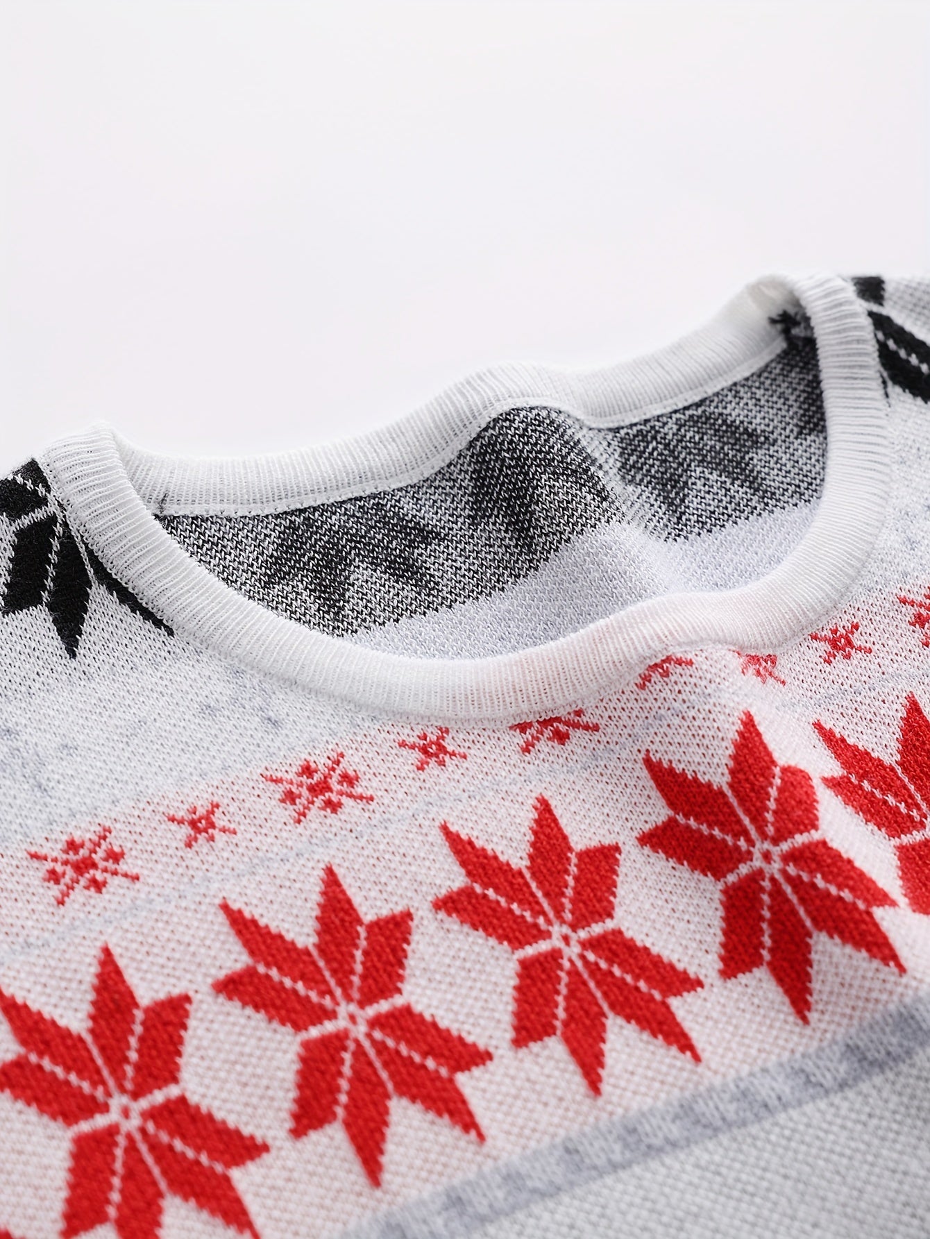 Knitted cable sweater with Christmas pattern