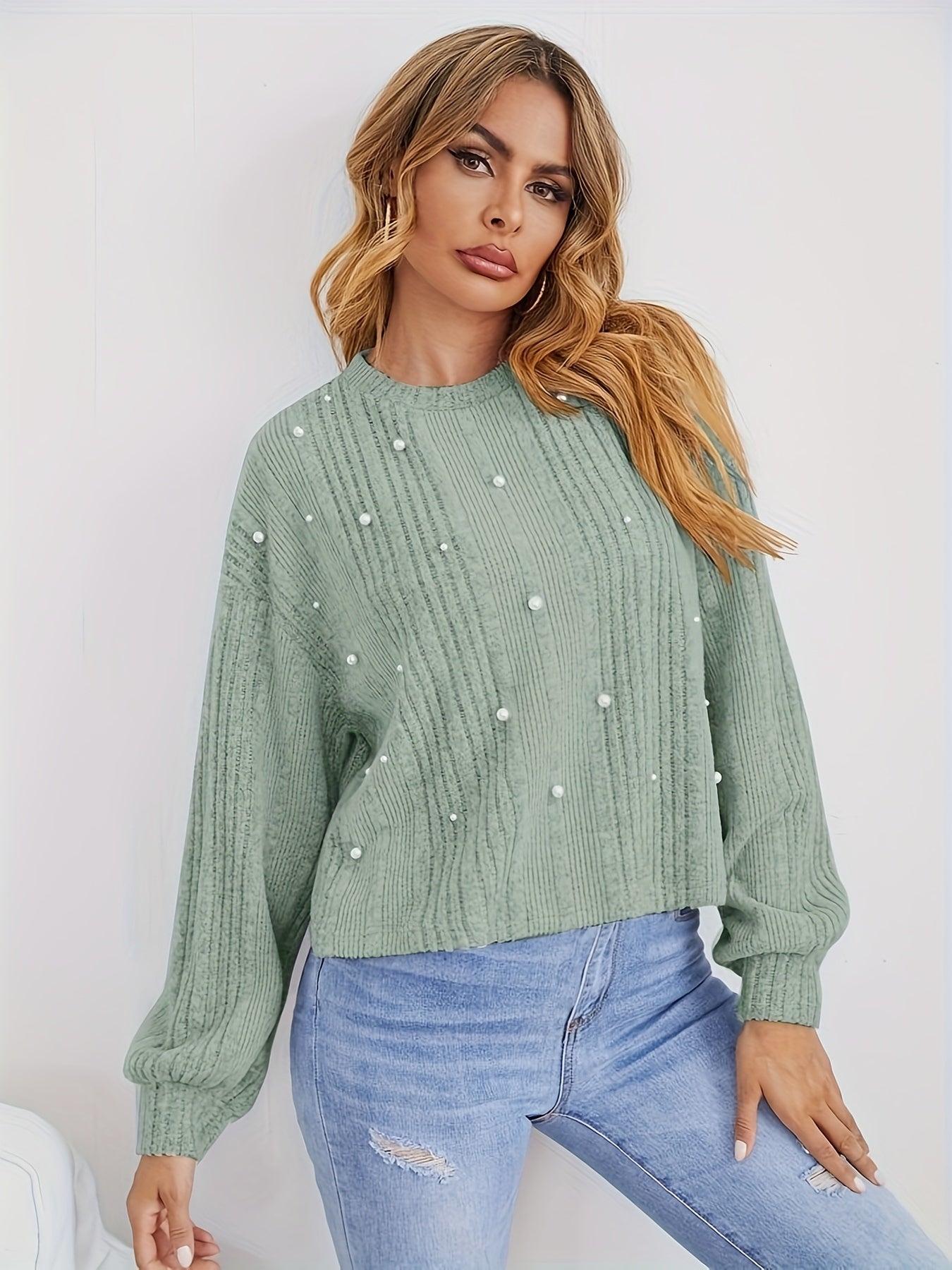 Ribbed sweater with round neck and pearl decoration