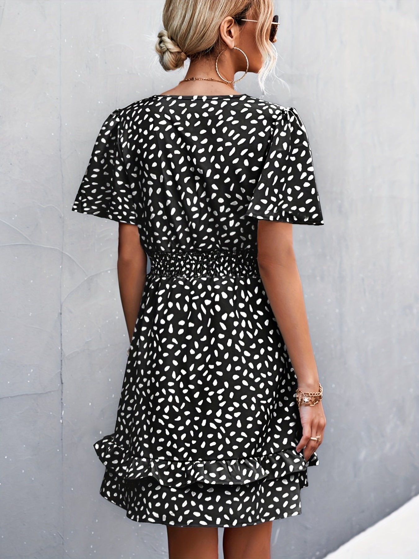 Dress with polka dots and ruffle sleeves