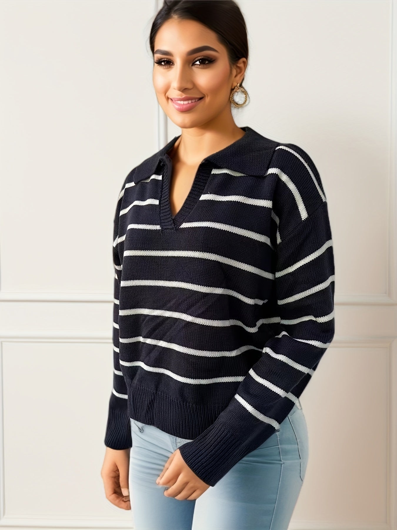 Knitted sweater with dropped shoulders and striped print