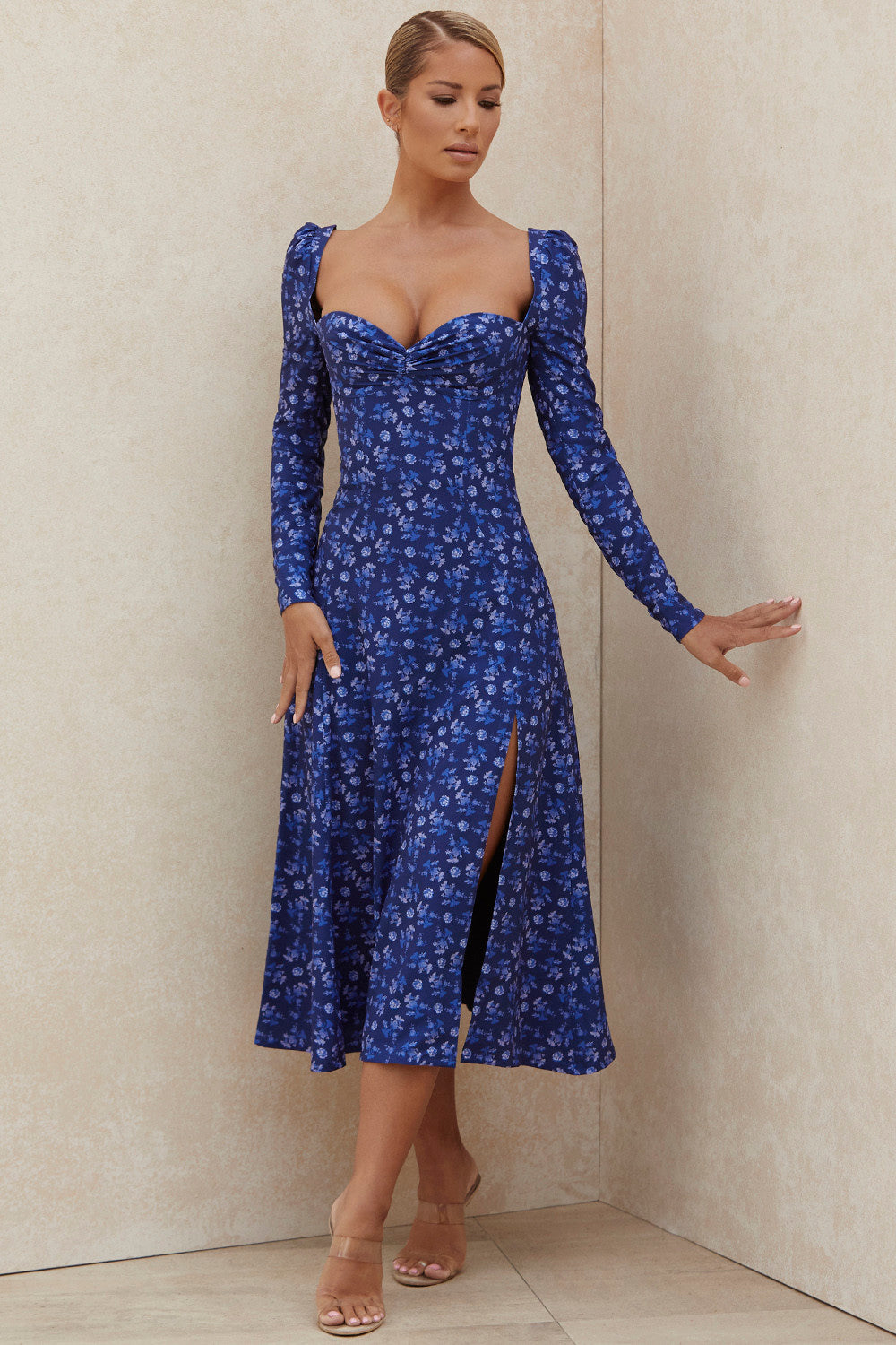 Sapphire colored midi dress with puff sleeves and flowers