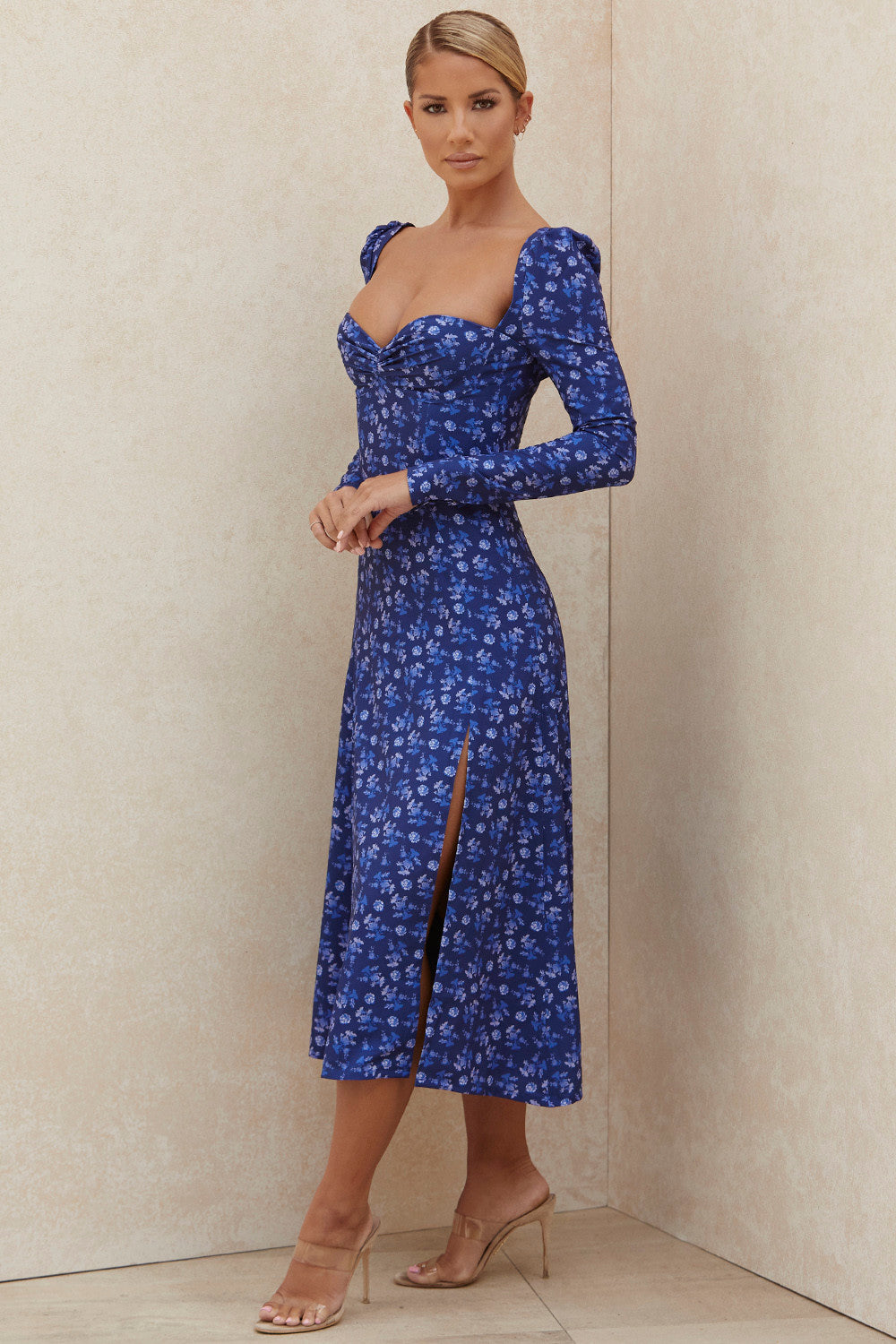 Sapphire colored midi dress with puff sleeves and flowers