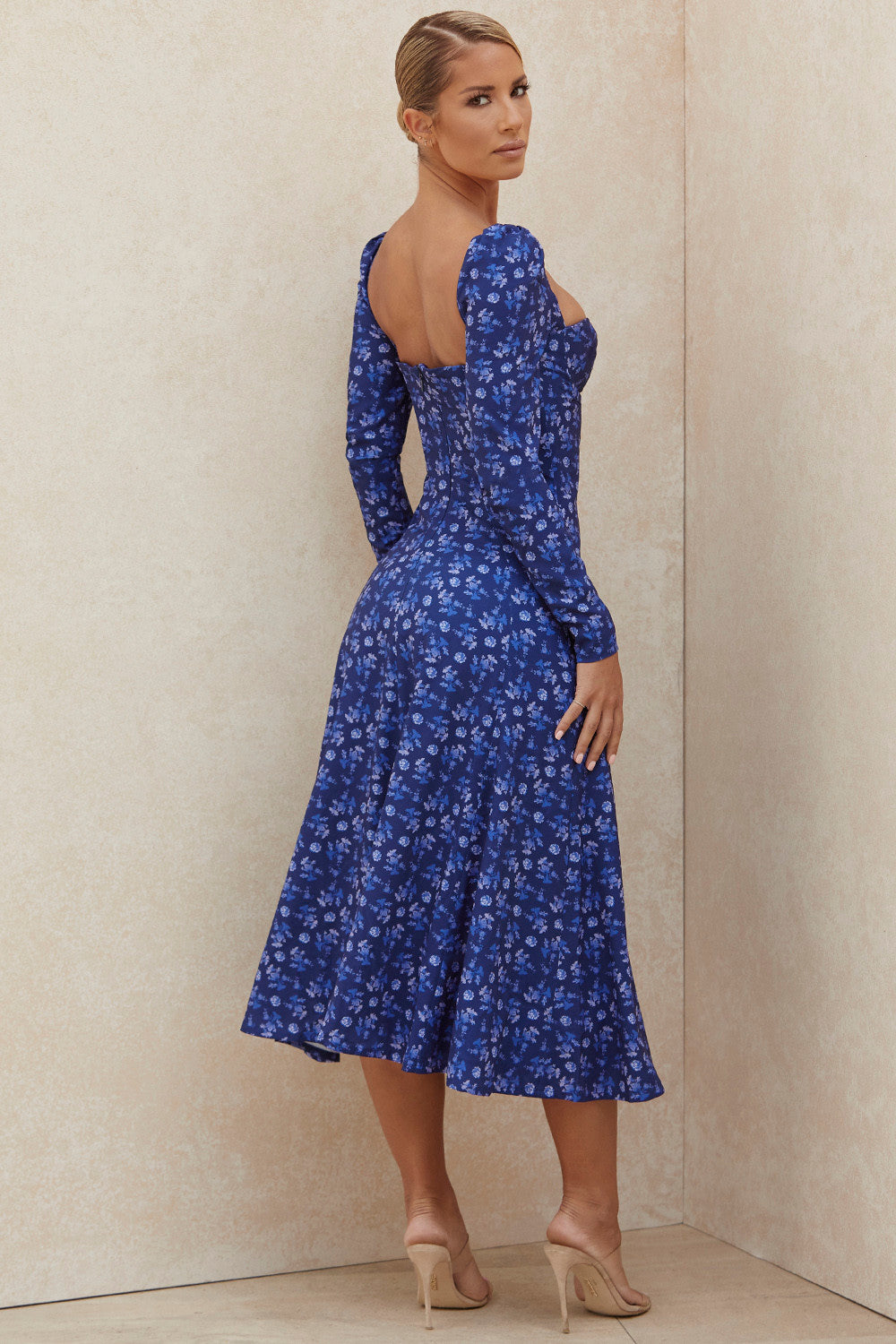 Sapphire colored midi dress with puff sleeves and flowers