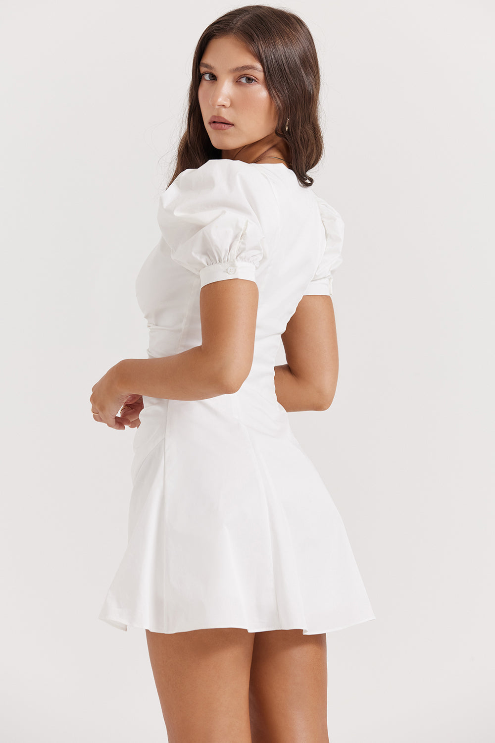 White mini dress with puff sleeves