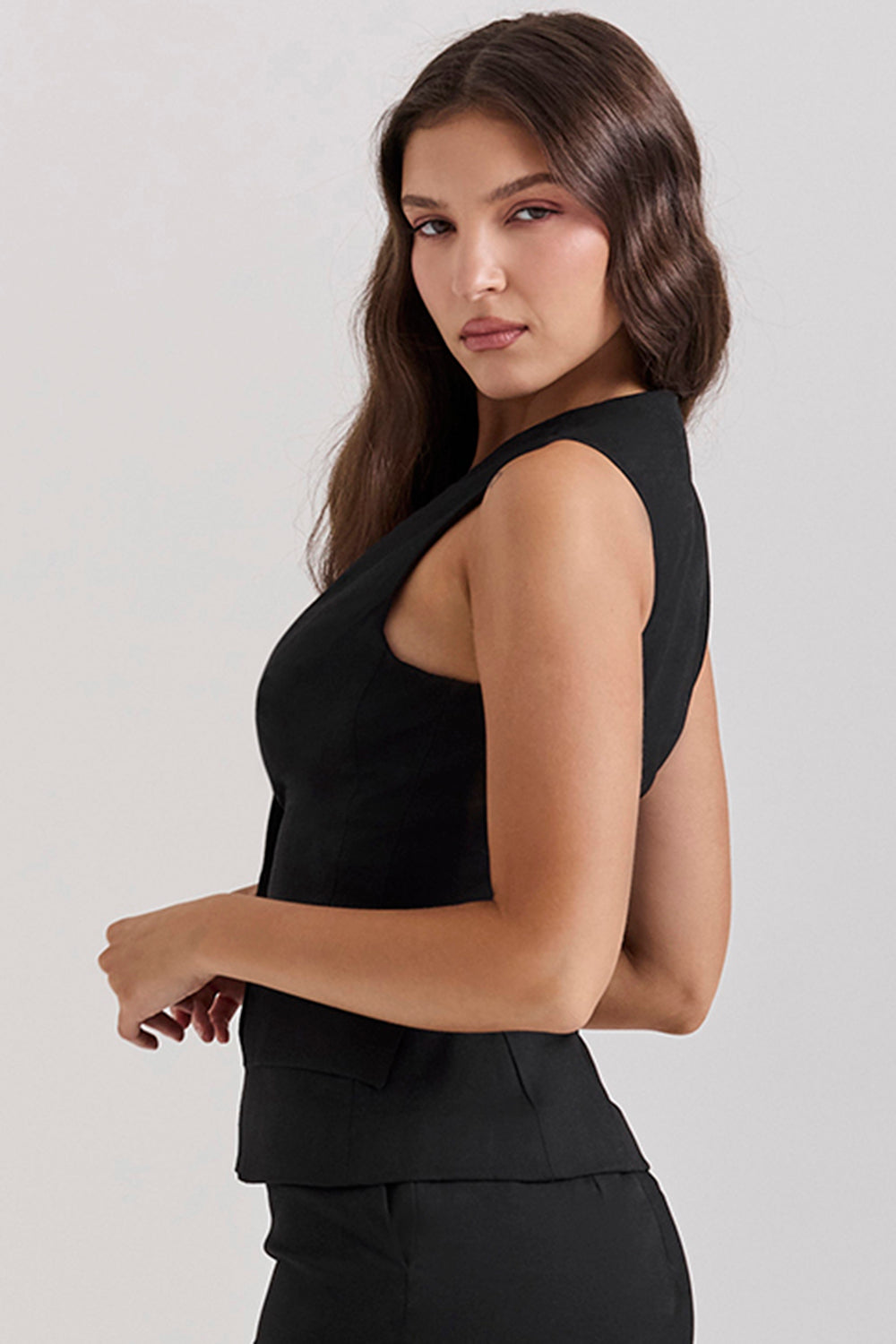 Black sleeveless tuxedo top with twill maxi skirt