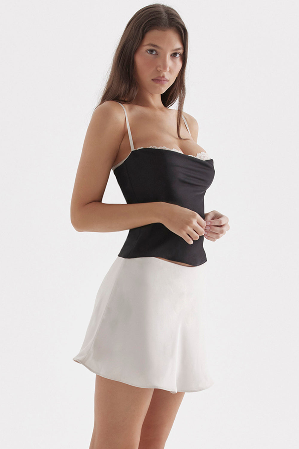 Black off white underwire top with mini skirt