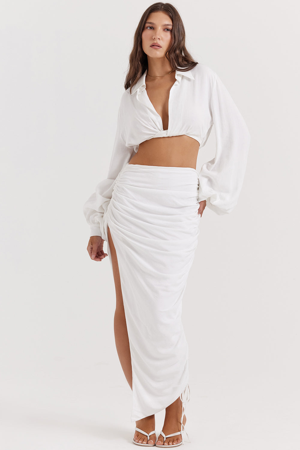 White deep blouson top with pleated maxi skirt