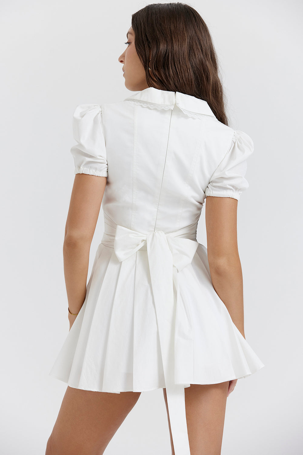 White pleated mini dress